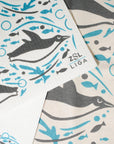 Organic Tea Towel | Swimming Penguins