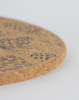 Sustainable cork placemat and coaster. Pinecone design