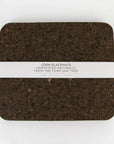 Smoked cork rectangle placemats on table
