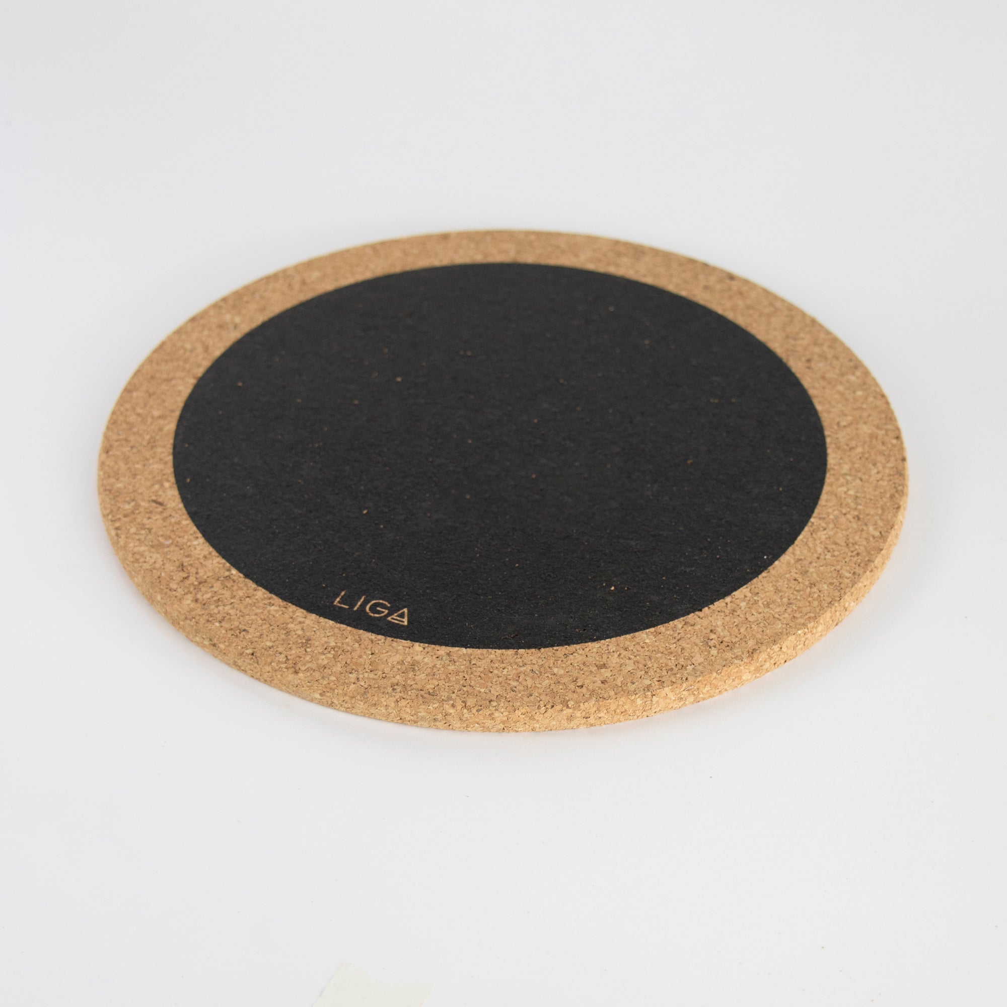 Eco friendly cork placemats + coasters. Black hole design