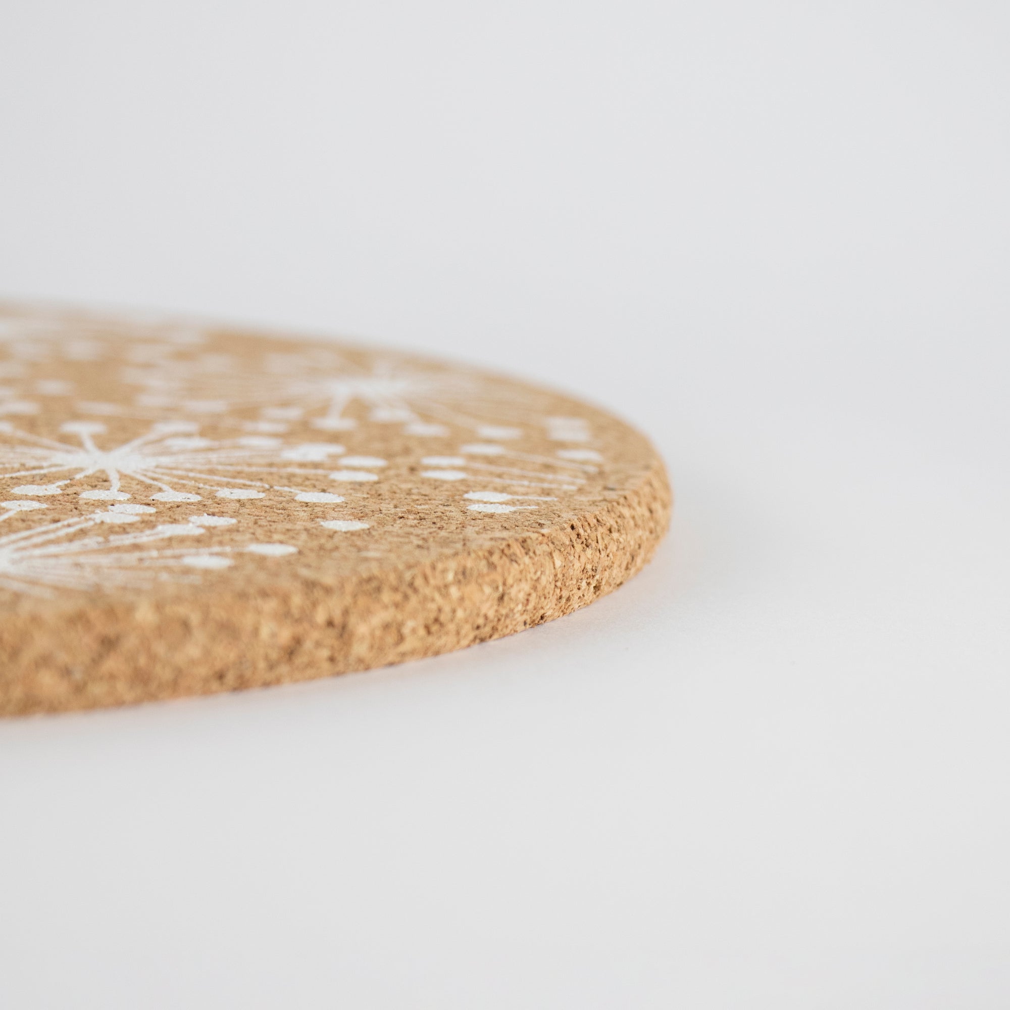 Eco friendly cork placemats + coasters. Dandelion design