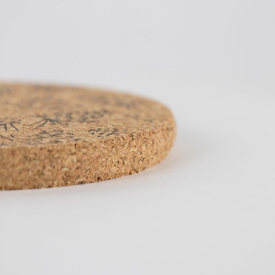 Sustainable cork placemat and coaster. Pinecone design