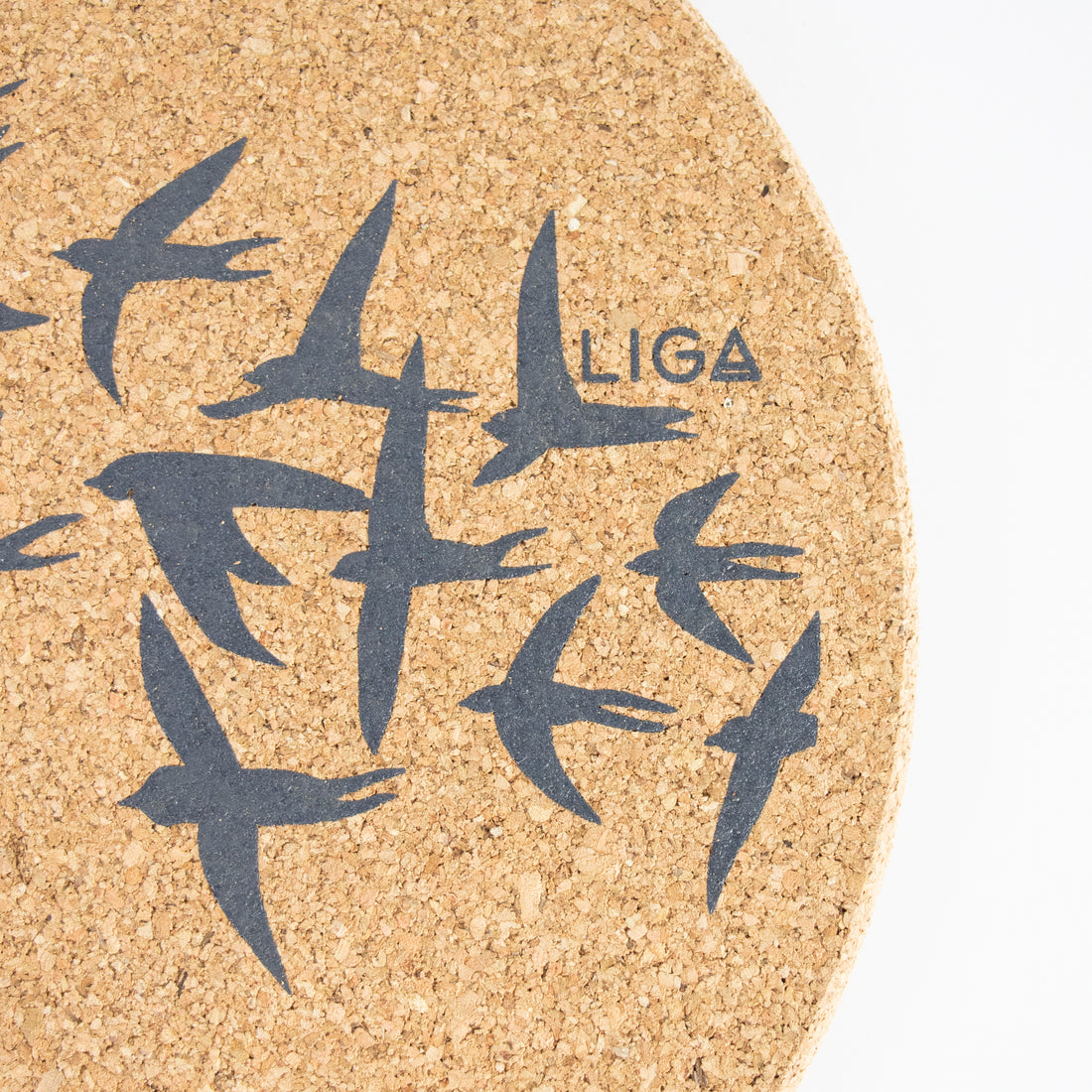 Sustainable cork placemat and coaster. Grey swallows