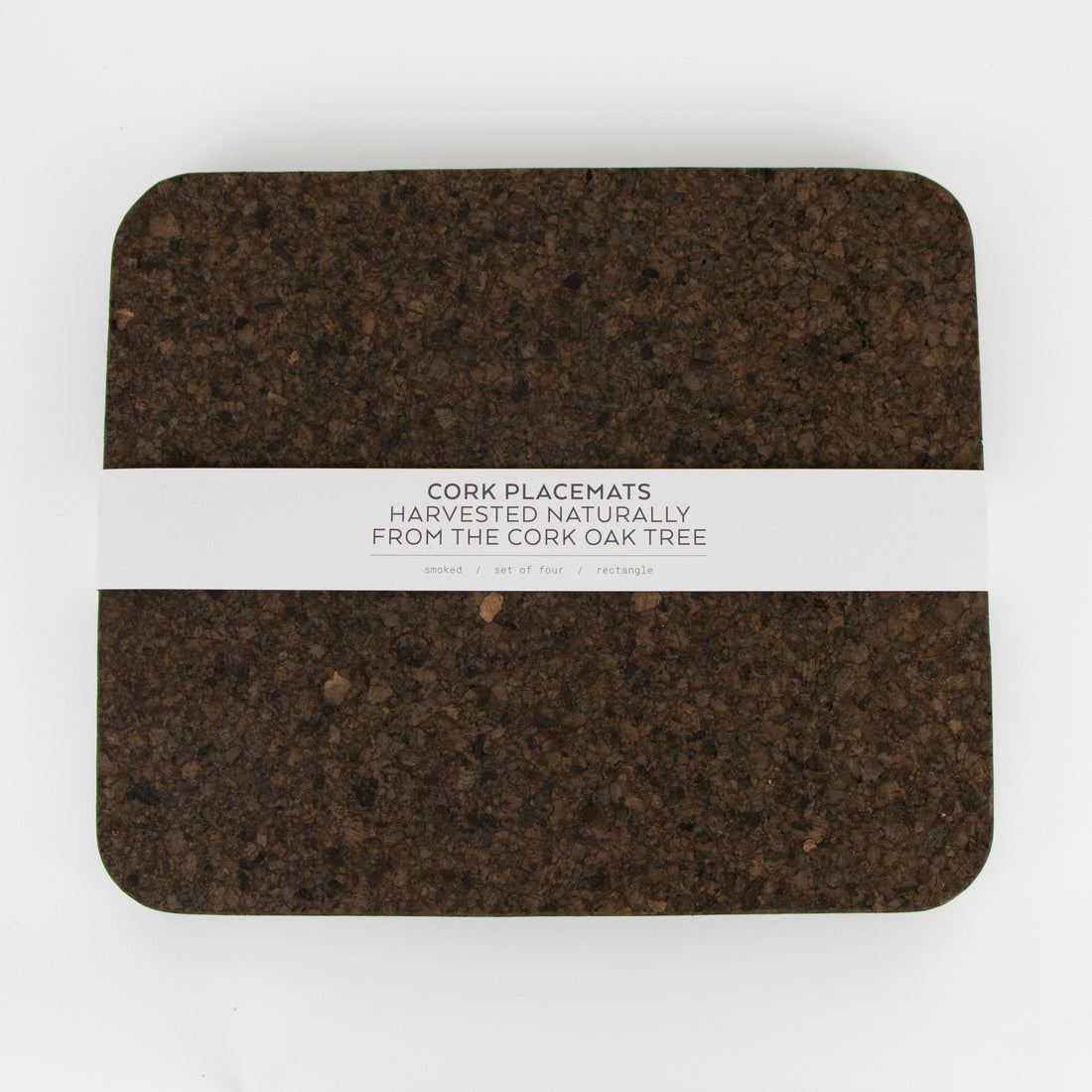 Smoked cork rectangle placemats on table