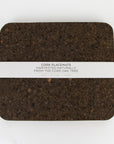 Smoked cork rectangle placemats on table