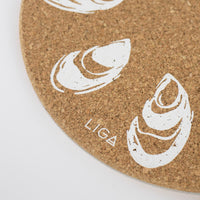 Sustainable cork placemat and coaster. Oyster design