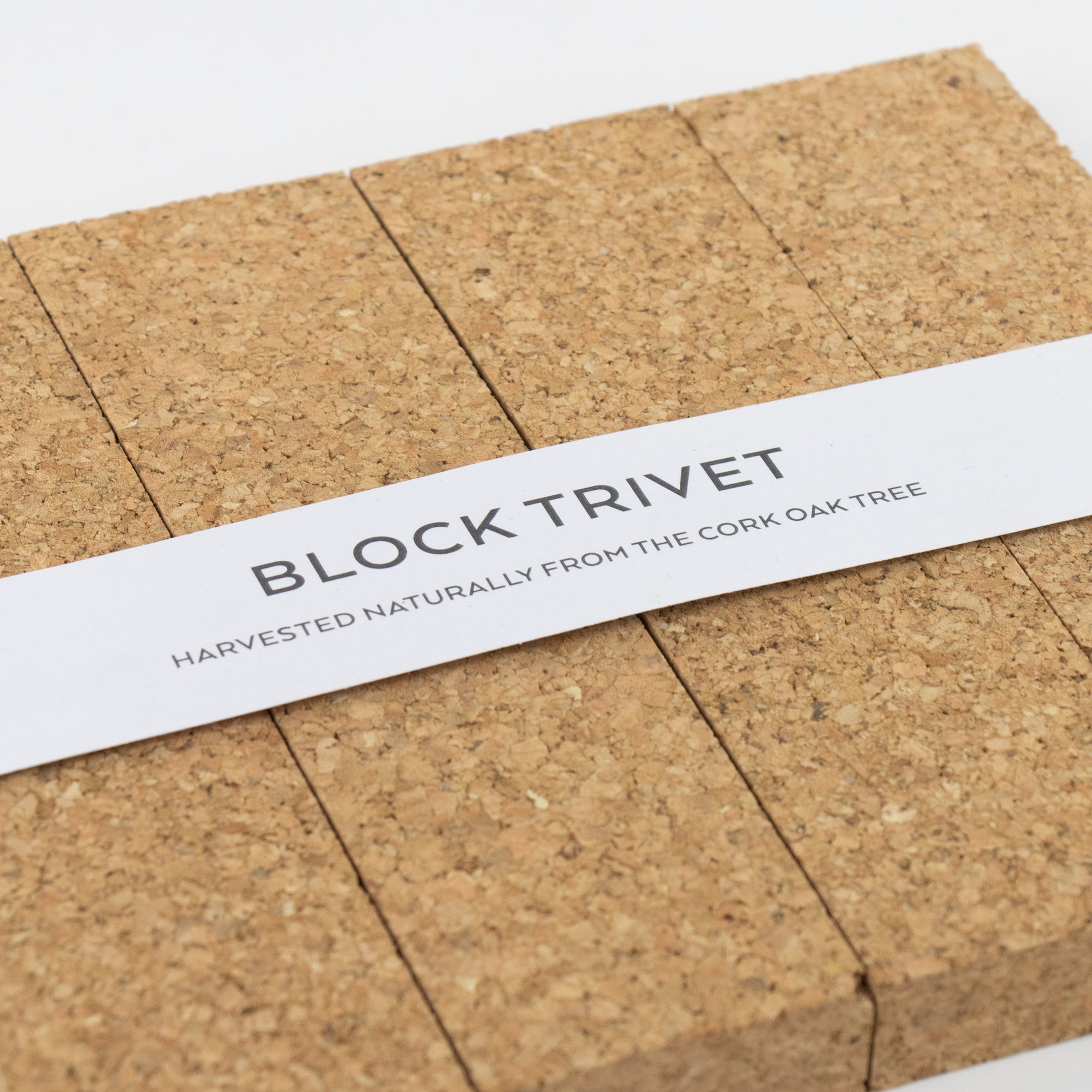 Organic cork block trivet with rope handles