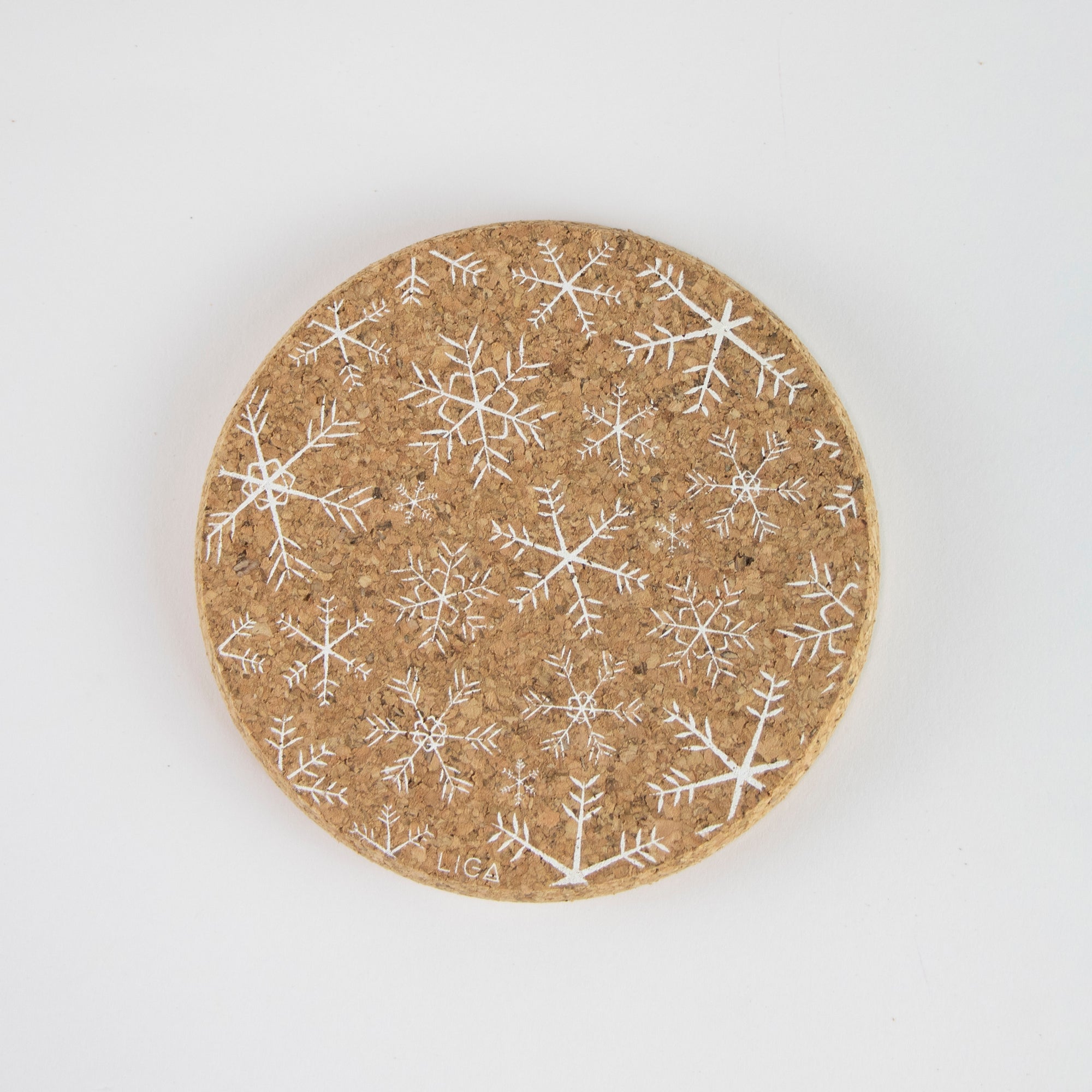 Eco friendly cork coasters. Snowflake design