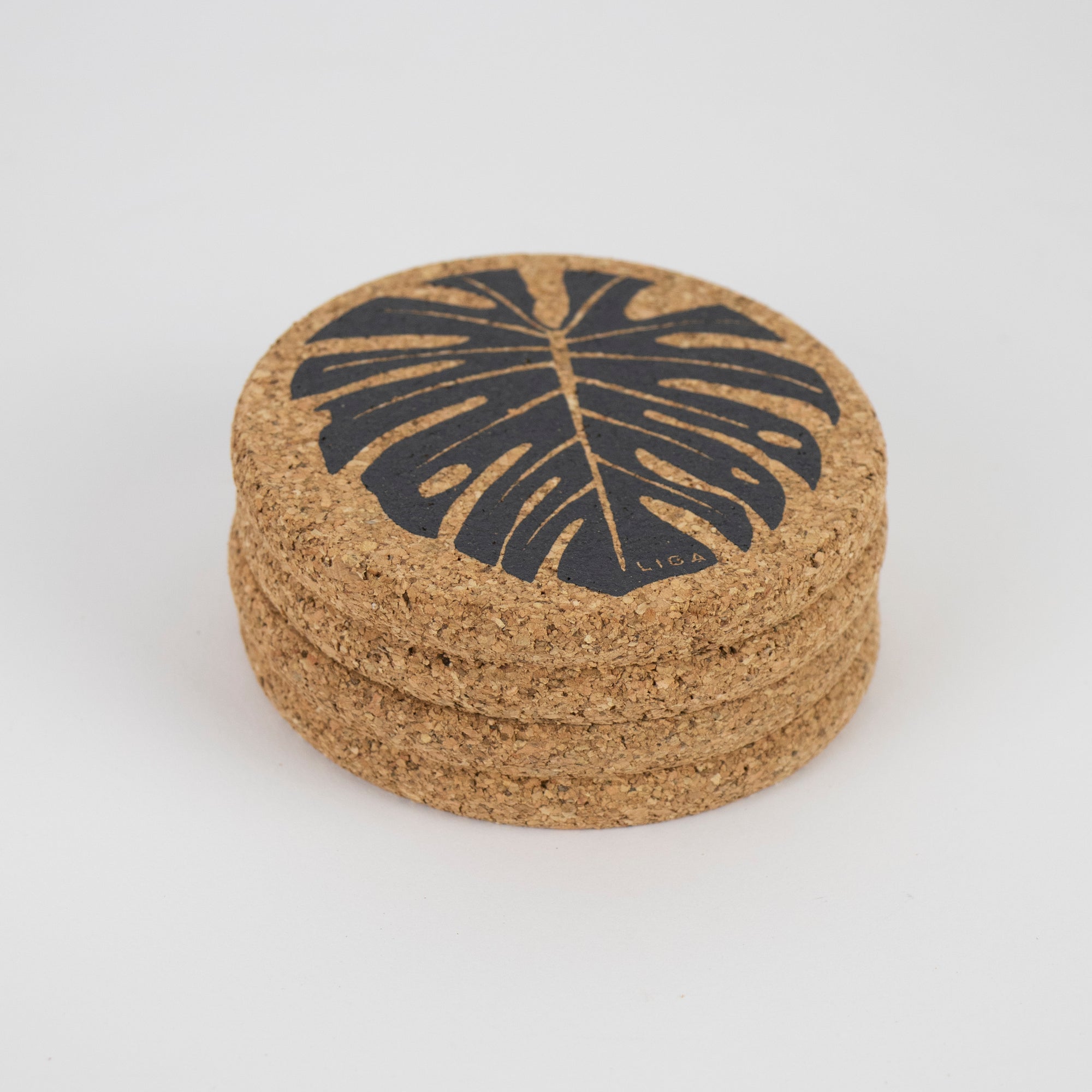 cork coasters with Monstera design