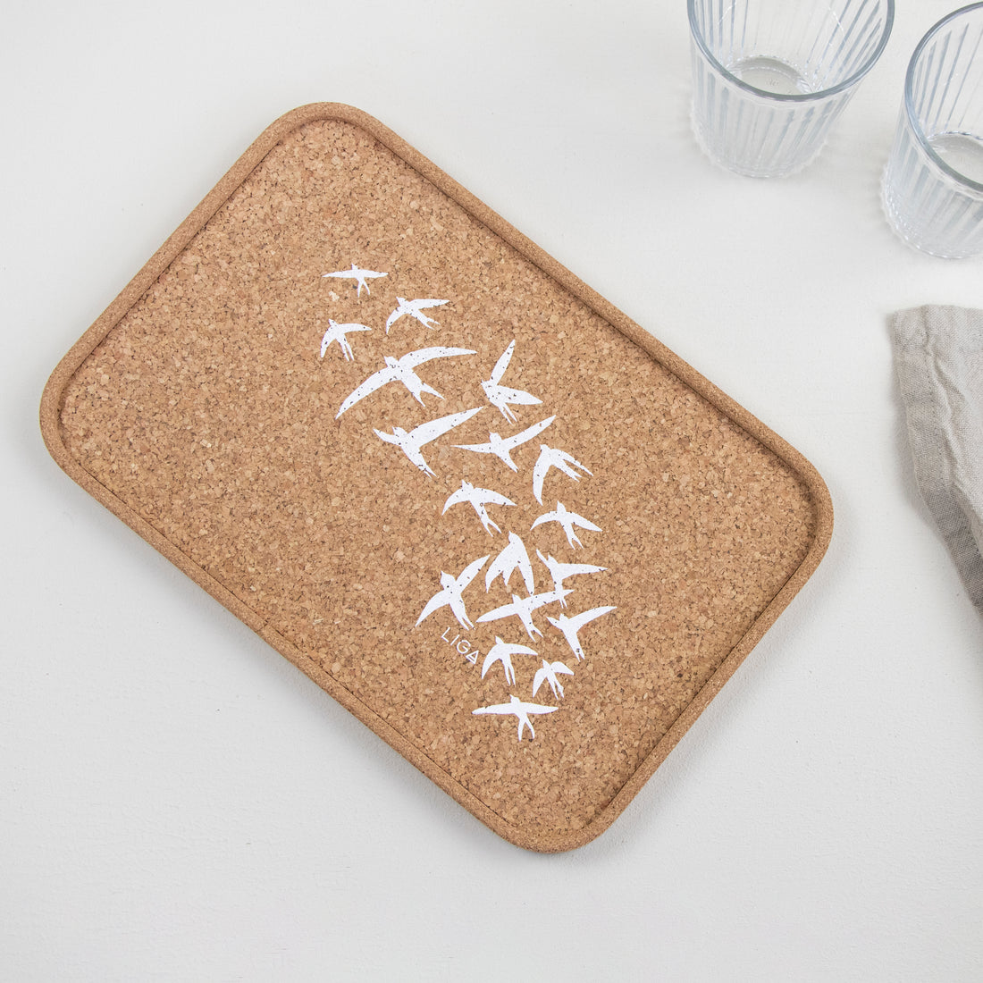 cork tray with swallow design