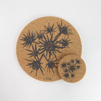 Sustainable cork placemat and coaster. Sea holly design