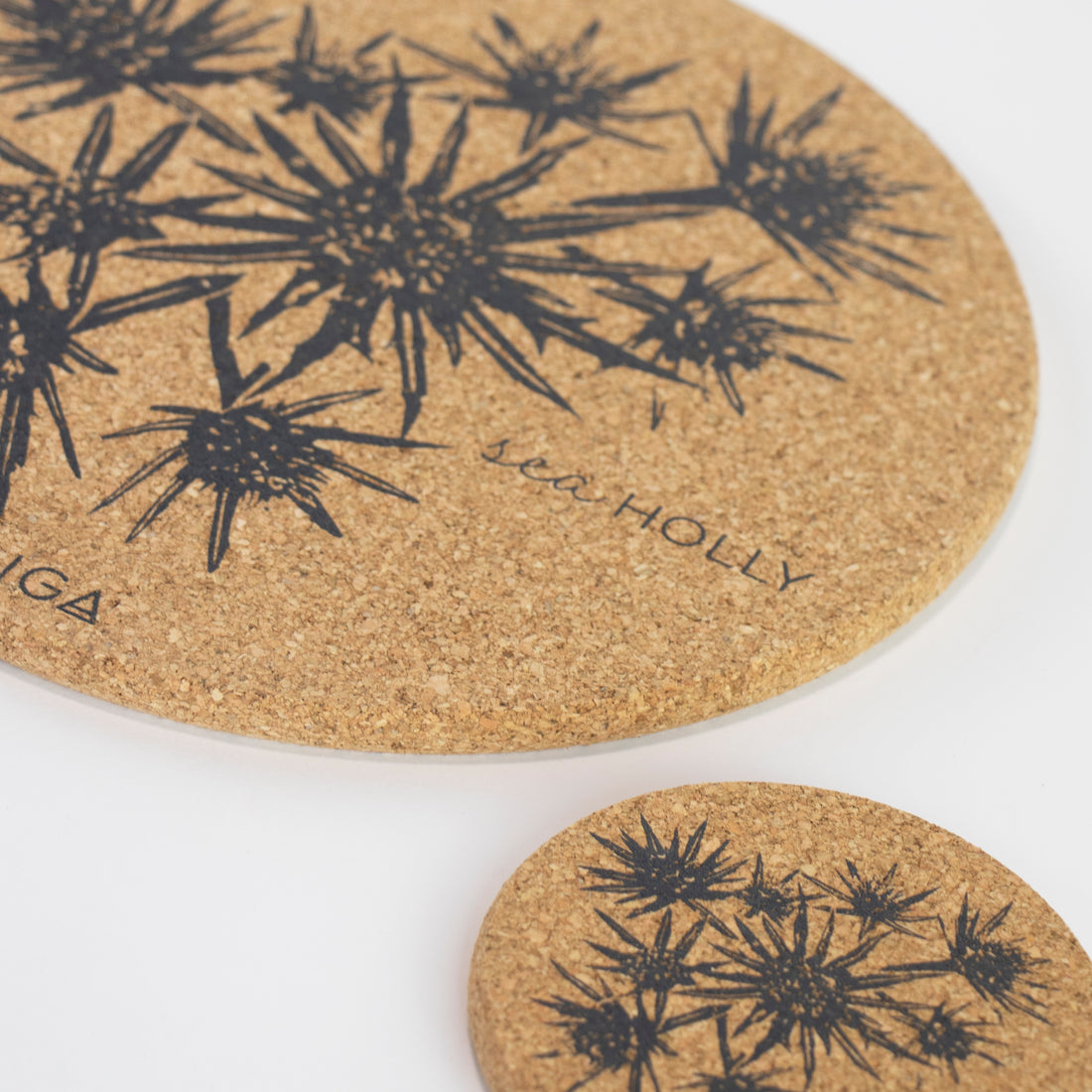 Sustainable cork placemat and coaster. Sea holly design